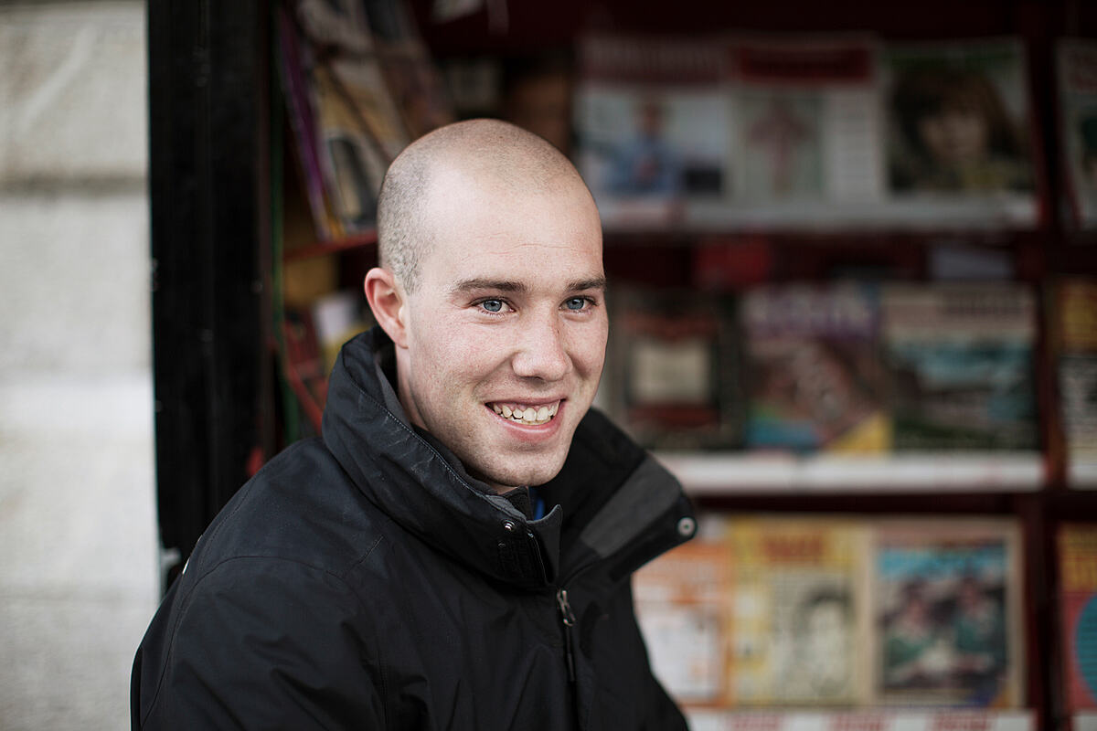 Chris the newspaper trader, O'Connell Street, Dublin | Colour photograph