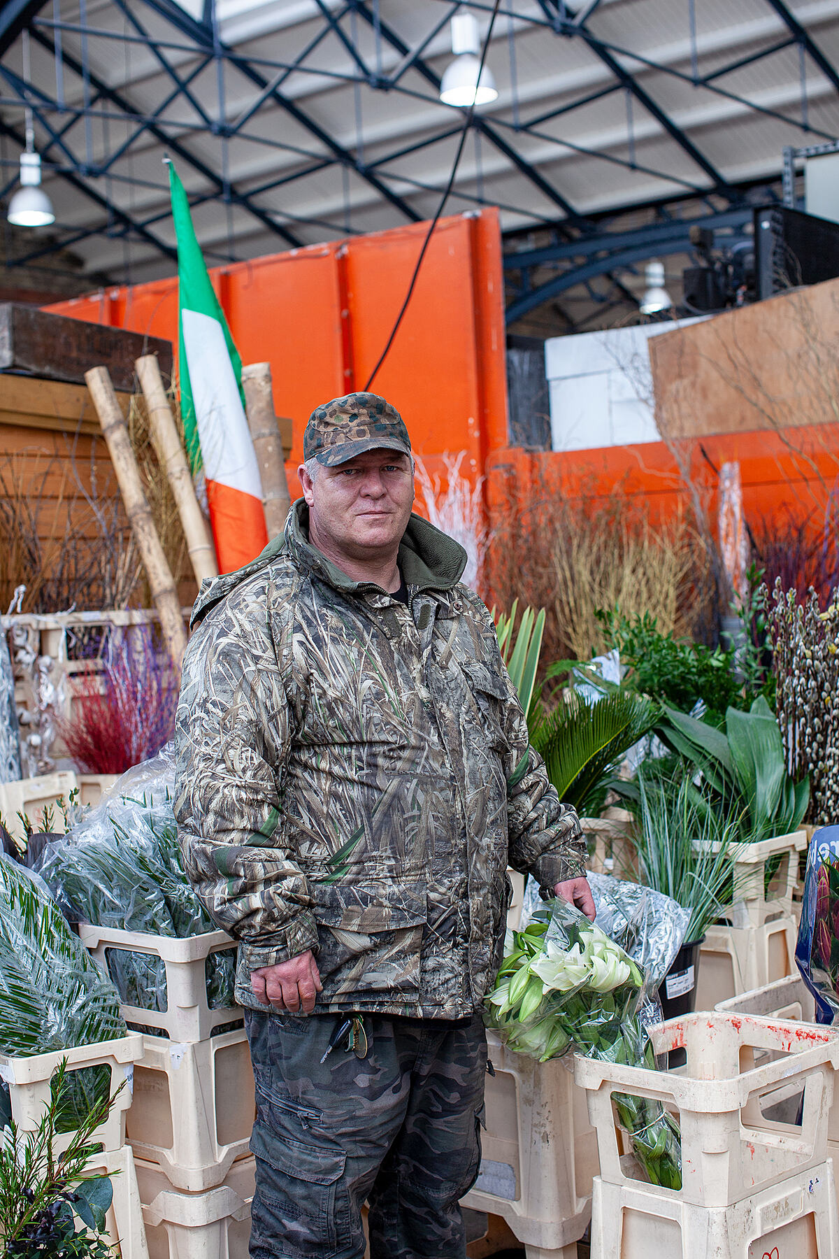 Flower delivery man | Colour photograph