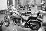 Harleys in Buddies lane | B&W photograph - 1990