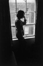 The visitor by the window | B&W photograph - 1990