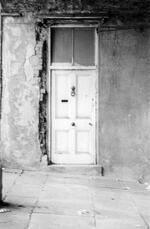Through the door | B&W photograph - 1990